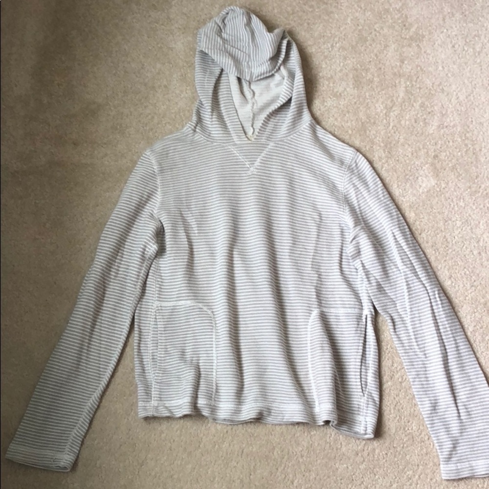 Fun and edgy! Love this striped hoody with pocket.